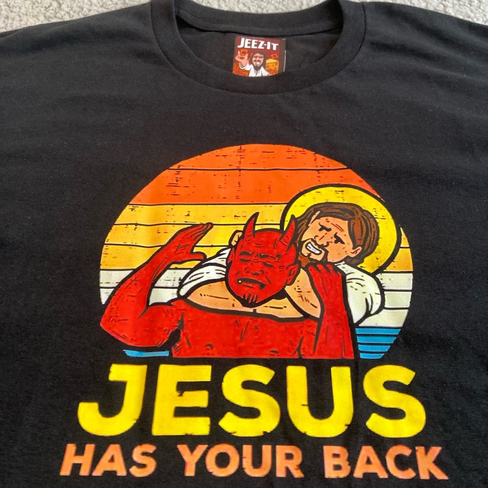 “Jesus Has Your Back” Devil Choke Men’s Black Tee NWT